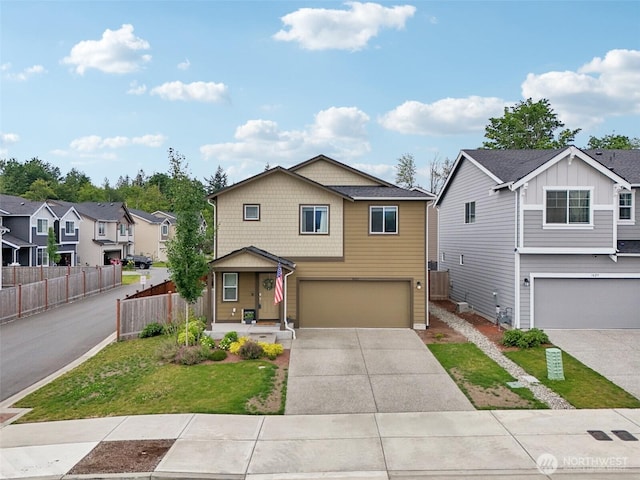 1423 Cascade St, Sultan, WA 98294 - view of front facade with a garage, concrete driveway, a porch, and a residential view