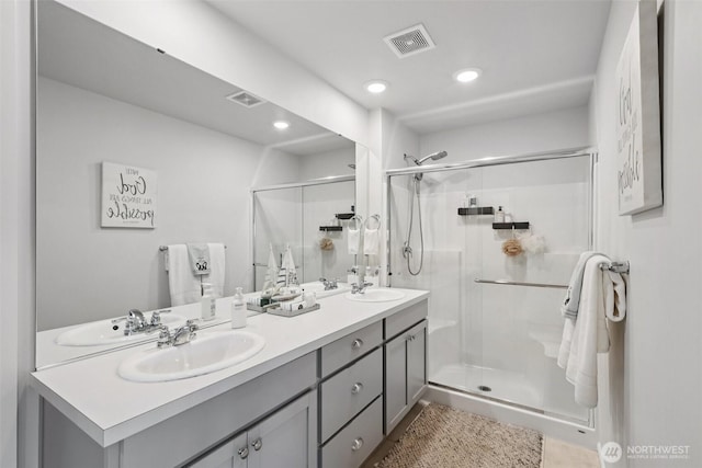 1423 Cascade St, Sultan, WA 98294 - bathroom with double vanity, a stall shower, and recessed lighting