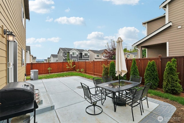 1423 Cascade St, Sultan, WA 98294 - fenced backyard featuring a residential view, a patio area, outdoor dining area, and a grill