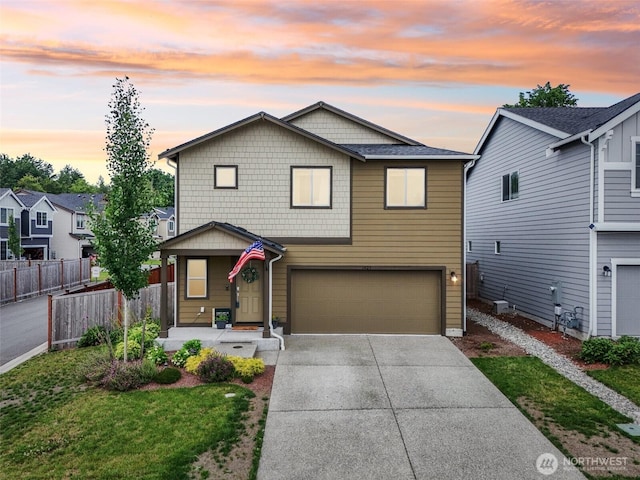 1423 Cascade St, Sultan, WA 98294 - view of front facade featuring an attached garage and concrete driveway