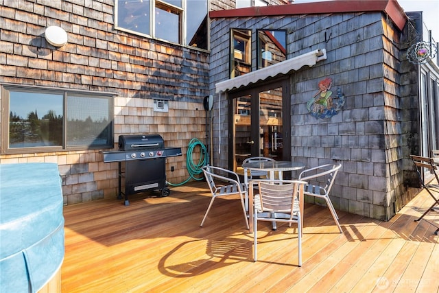3123 Fairview Ave E Unit 2, Seattle, WA 98102 - wooden terrace with area for grilling and outdoor dining area