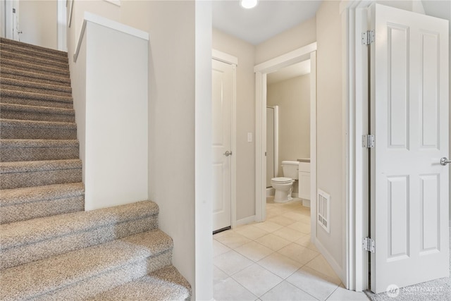 4239 NE 3rd Ln, Renton, WA 98059 - staircase with tile patterned flooring and baseboards