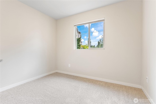 4239 NE 3rd Ln, Renton, WA 98059 - unfurnished room featuring carpet floors and baseboards