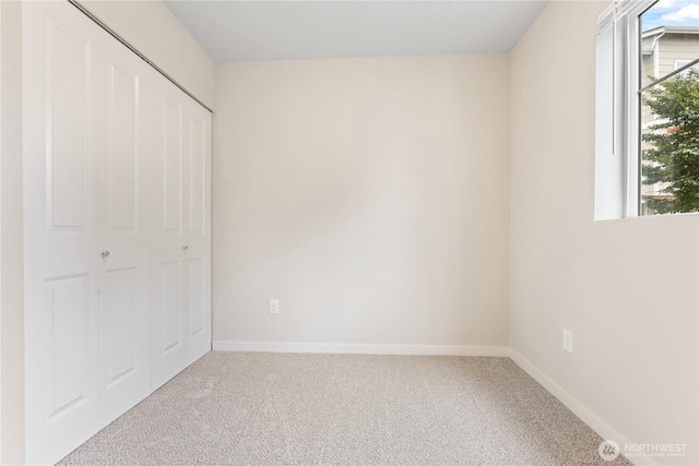 4239 NE 3rd Ln, Renton, WA 98059 - unfurnished bedroom with carpet flooring and a closet
