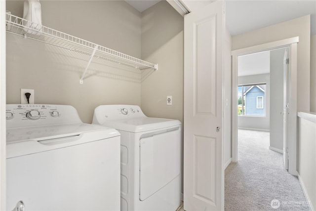 4239 NE 3rd Ln, Renton, WA 98059 - laundry room featuring washing machine and clothes dryer and light colored carpet