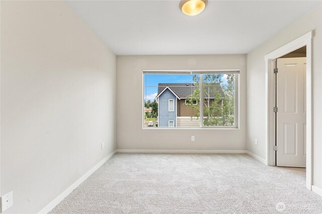 4239 NE 3rd Ln, Renton, WA 98059 - unfurnished room with carpet flooring and baseboards