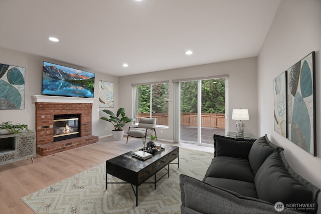 14691 NE 16th St, Bellevue, WA 98007 - living room featuring wood finished floors, recessed lighting, and a brick fireplace