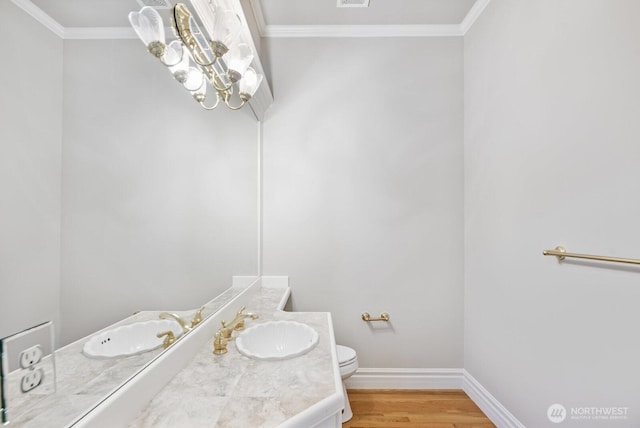 14691 NE 16th St, Bellevue, WA 98007 - bathroom with crown molding, vanity, and wood finished floors