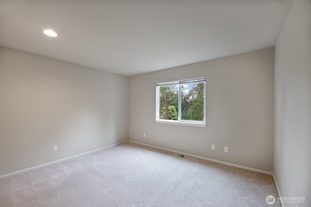 14691 NE 16th St, Bellevue, WA 98007 - empty room featuring carpet flooring and recessed lighting