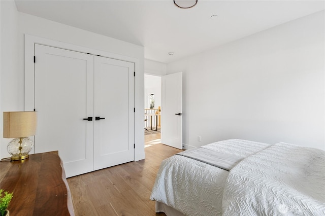 10520 NE 111th Pl, Kirkland, WA 98033 - bedroom with wood finished floors and a closet