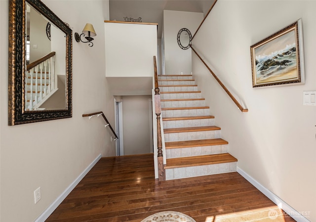 1223 Rainier Ln, Oak Harbor, WA 98277 - stairs with wood finished floors and baseboards