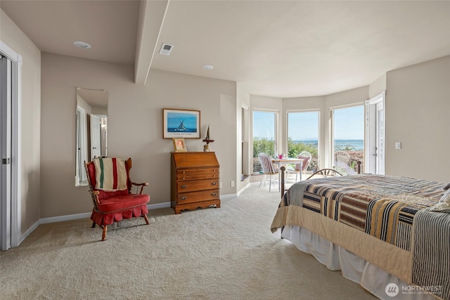 1223 Rainier Ln, Oak Harbor, WA 98277 - carpeted bedroom with a water view and access to exterior
