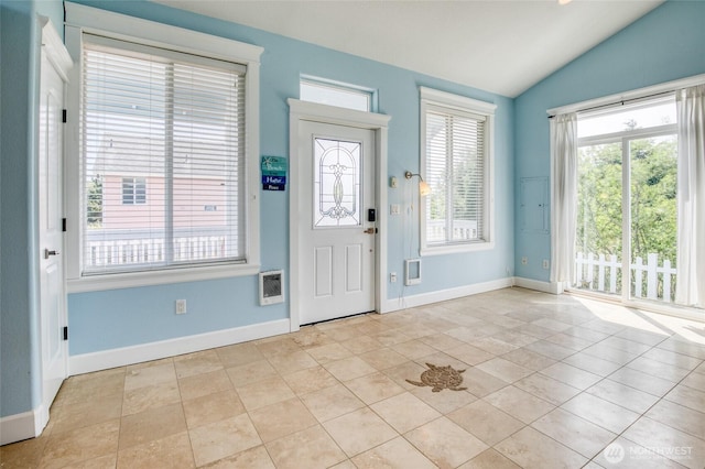 440 Marine View Dr SW Unit 3, Ocean Shores, WA 98569 - entrance foyer with lofted ceiling, light tile patterned flooring, and heating unit