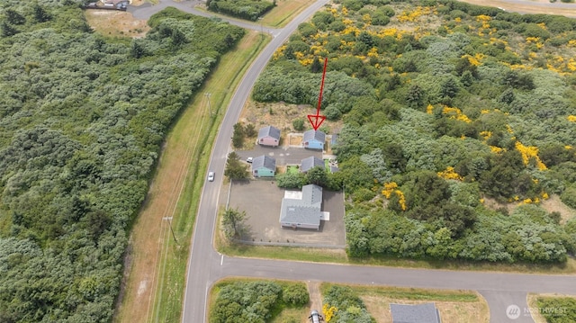 440 Marine View Dr SW Unit 3, Ocean Shores, WA 98569 - aerial view of property and surrounding area with a heavily wooded area