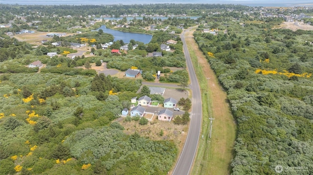 440 Marine View Dr SW Unit 3, Ocean Shores, WA 98569 - aerial overview of property's location with a nearby body of water and a forest