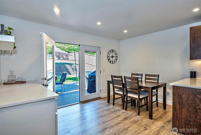 14305 109th Ave NE, Kirkland, WA 98034 - dining area featuring light wood finished floors and recessed lighting