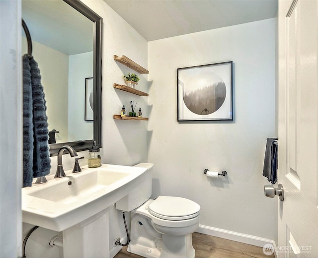 14305 109th Ave NE, Kirkland, WA 98034 - half bathroom featuring baseboards and wood finished floors