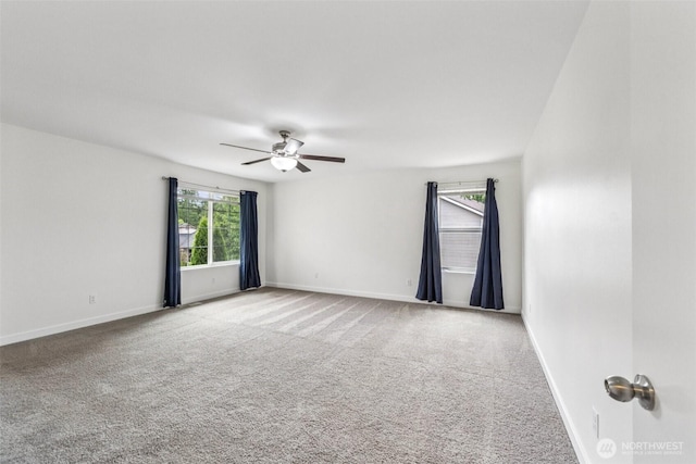 29775 218th Pl SE, Kent, WA 98042 - carpeted empty room with ceiling fan and baseboards
