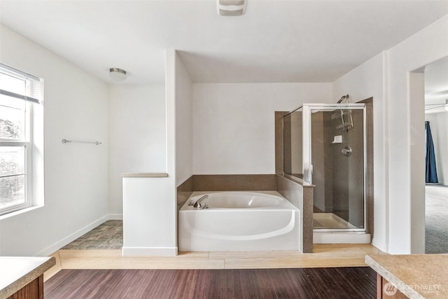 29775 218th Pl SE, Kent, WA 98042 - full bathroom with a garden tub, a shower stall, vanity, and wood finished floors