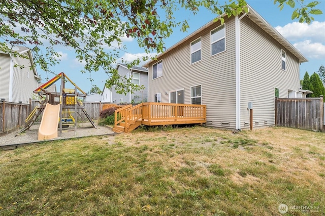 29775 218th Pl SE, Kent, WA 98042 - back of property featuring a fenced backyard, a playground, and a deck