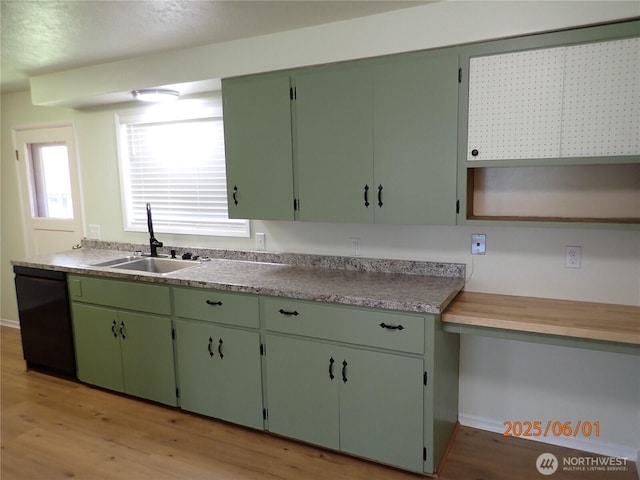 502504 4th St, Hoquiam, WA 98550 - kitchen with black dishwasher, light wood-style floors, and open shelves