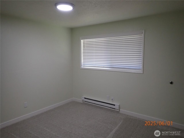 502504 4th St, Hoquiam, WA 98550 - carpeted empty room with baseboard heating and baseboards