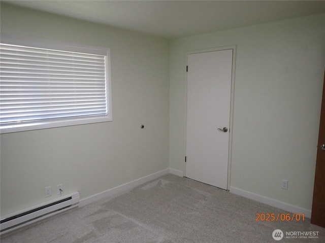 502504 4th St, Hoquiam, WA 98550 - unfurnished room featuring baseboard heating and light colored carpet