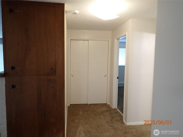 502504 4th St, Hoquiam, WA 98550 - hallway featuring carpet and baseboards