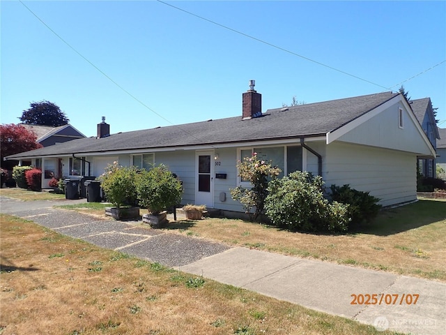 502504 4th St, Hoquiam, WA 98550 - view of front of property with a chimney