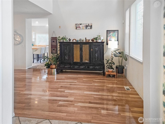 503 S 47th St Unit 11F, Renton, WA 98055 - living area with healthy amount of natural light and wood finished floors