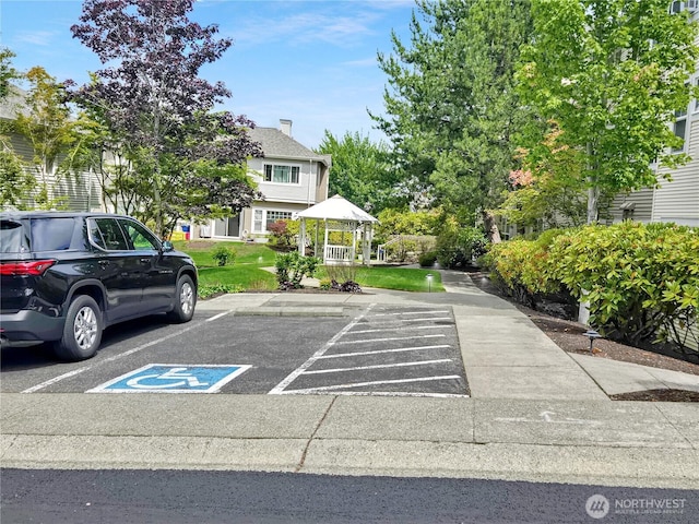 503 S 47th St Unit 11F, Renton, WA 98055 - uncovered parking lot featuring a gazebo