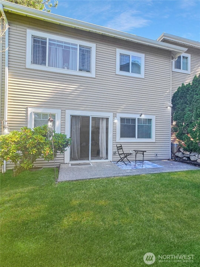 503 S 47th St Unit 11F, Renton, WA 98055 - back of house with a yard and a patio area