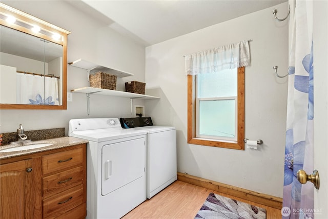 1810 Casassa Rd, Cle Elum, WA 98922 - laundry room featuring washing machine and dryer and light wood-style floors