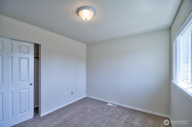 1602 Sundrop Ln SE, Tumwater, WA 98501 - unfurnished room featuring carpet floors and baseboards