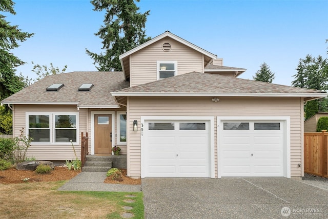 301 236th Pl SW, Bothell, WA 98021 - traditional-style home featuring a garage, asphalt driveway, and a shingled roof