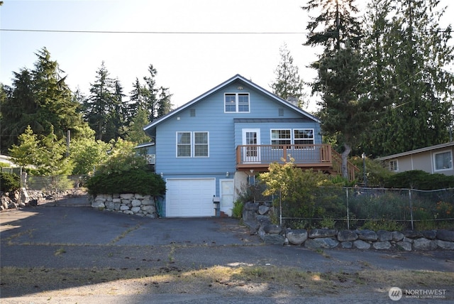 990 Madrona Way, Sequim, WA 98382 - view of front facade featuring an attached garage, driveway, and a deck