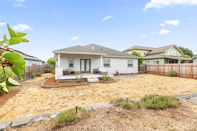 515 N Knapman Ave, Sequim, WA 98382 - rear view of house featuring a fenced backyard and a wooden deck