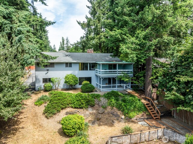 1847 N 183rd St, Shoreline, WA 98133 - rear view of property with stairway, a chimney, and a shingled roof