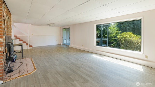 1847 N 183rd St, Shoreline, WA 98133 - unfurnished living room with wood finished floors and stairway