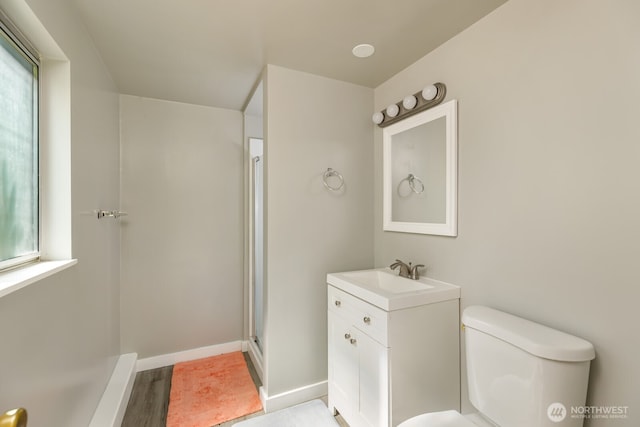 1847 N 183rd St, Shoreline, WA 98133 - full bathroom featuring vanity, a stall shower, and wood finished floors