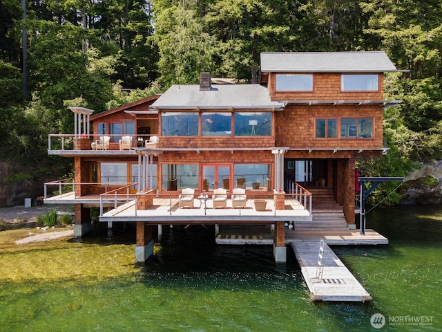 2247 Northshore Rd, Bellingham, WA 98226 - rear view of property featuring a water view, a chimney, and a forest view