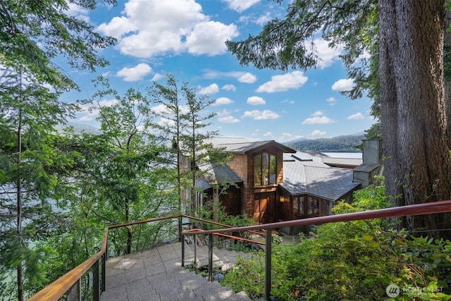 2247 Northshore Rd, Bellingham, WA 98226 - exterior space with a shingled roof and a chimney