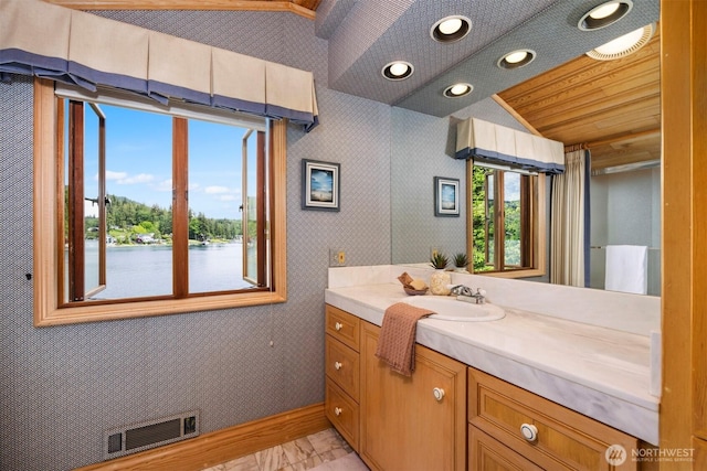 2247 Northshore Rd, Bellingham, WA 98226 - bathroom featuring vanity, recessed lighting, wallpapered walls, and a water view