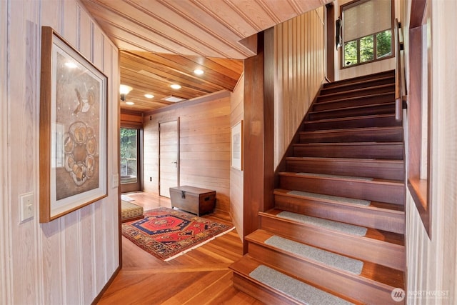 2247 Northshore Rd, Bellingham, WA 98226 - stairs with wooden walls, wood finished floors, healthy amount of natural light, and recessed lighting