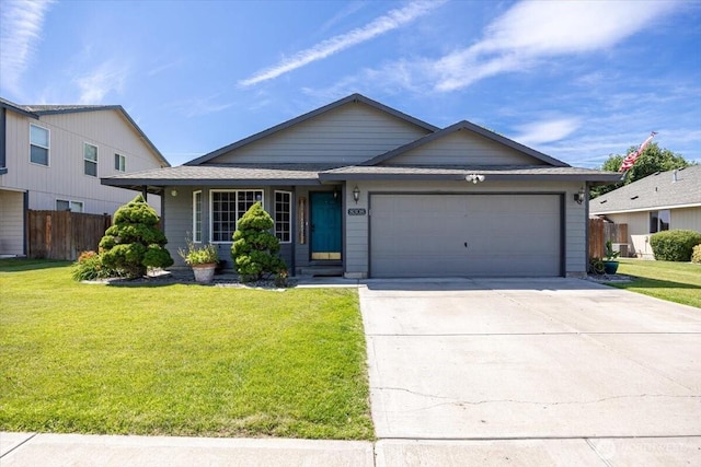 8308 Langara Dr, Pasco, WA 99301 - ranch-style house with an attached garage and concrete driveway