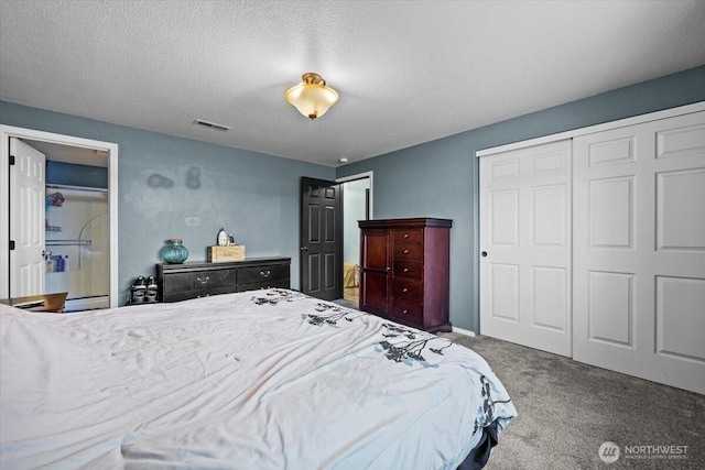 8308 Langara Dr, Pasco, WA 99301 - bedroom featuring carpet floors and a textured ceiling