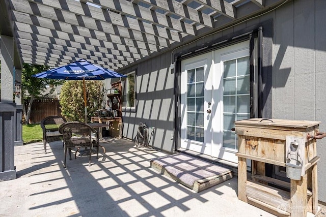 8308 Langara Dr, Pasco, WA 99301 - view of patio with french doors, a pergola, and outdoor dining area