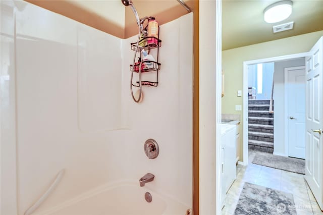 4243 Holcomb St, Port Townsend, WA 98368 - bathroom featuring shower / washtub combination, vanity, and tile patterned flooring