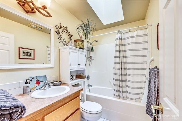 4243 Holcomb St, Port Townsend, WA 98368 - full bath with a skylight, vanity, and shower / tub combo