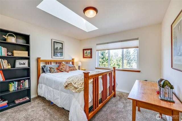 4243 Holcomb St, Port Townsend, WA 98368 - bedroom featuring a skylight and carpet flooring